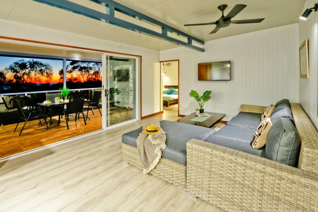 a living room with a couch and a table at Wine Down in Agnes Water
