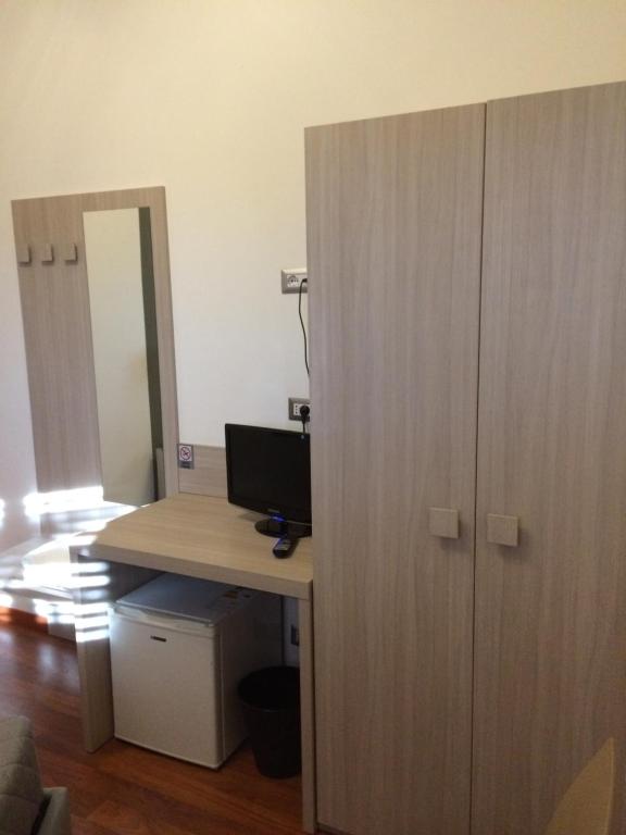 TV a/nebo společenská místnost v ubytování Twelve Hotel