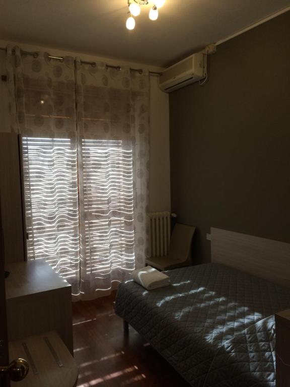 Postel nebo postele na pokoji v ubytování Twelve Hotel