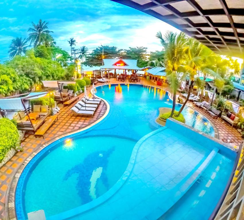 an overhead view of a swimming pool at a resort at Natural Park Resort Pattaya in Jomtien Beach