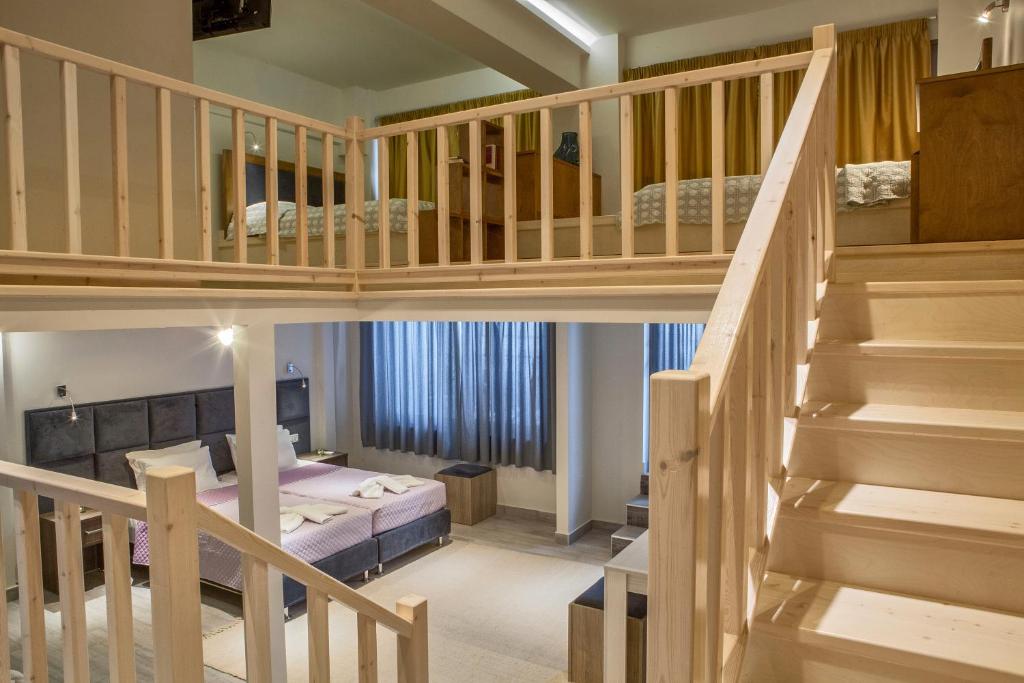 Postel nebo postele na pokoji v ubytování Mari Hotel & Maisonettes