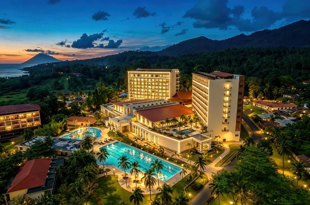 an aerial view of a resort with a pool at NDC Resort & Spa in Manado