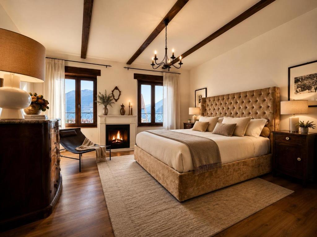 a bedroom with a large bed and a fireplace at ComeCasa Langhe Garden House-Pace e Panorama a Benevello in Benevello