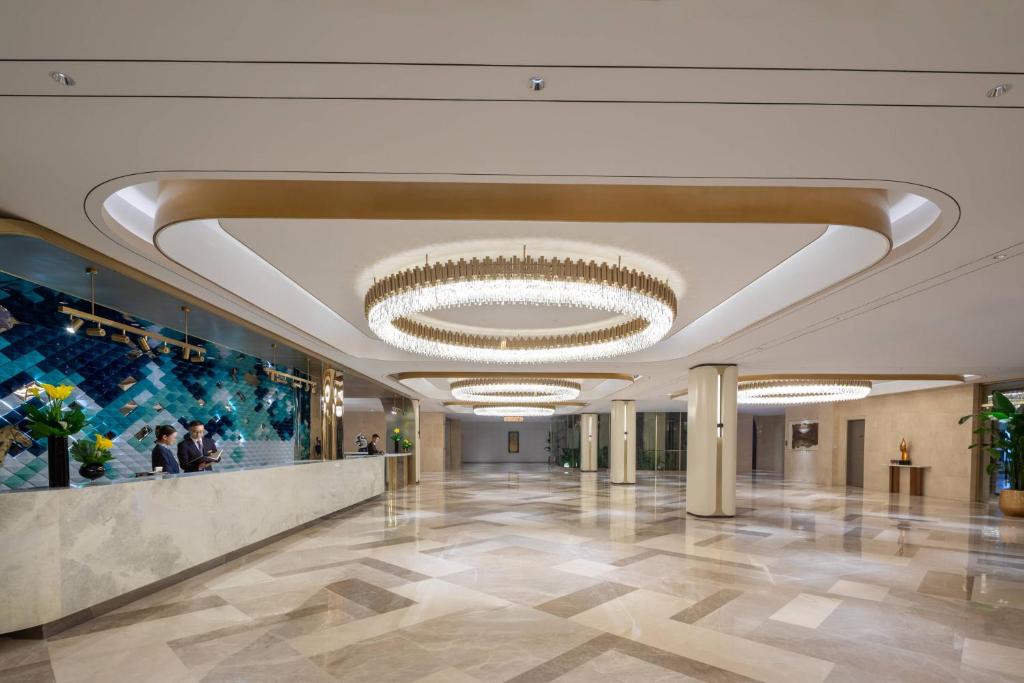 لابی و فضای عمومی Sunworld Dynasty Hotel Beijing Wangfujing - تصویر ۵