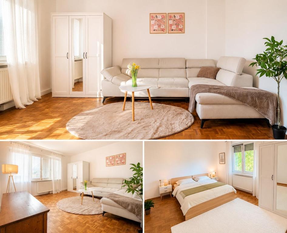 a living room with a couch and a table at Helena City Apartment in Leoben