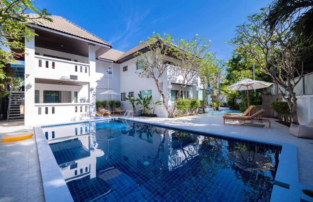 an image of a swimming pool in a villa at Phuket Leisure Time Hotel in Rawai Beach