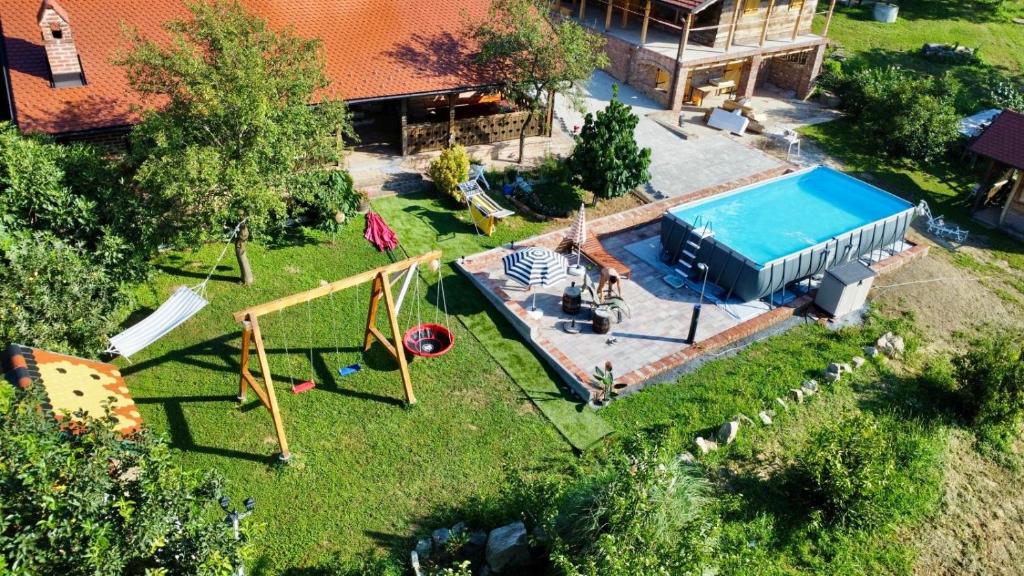 an aerial view of a backyard with a swimming pool at Sekin Vinograd in Voloder