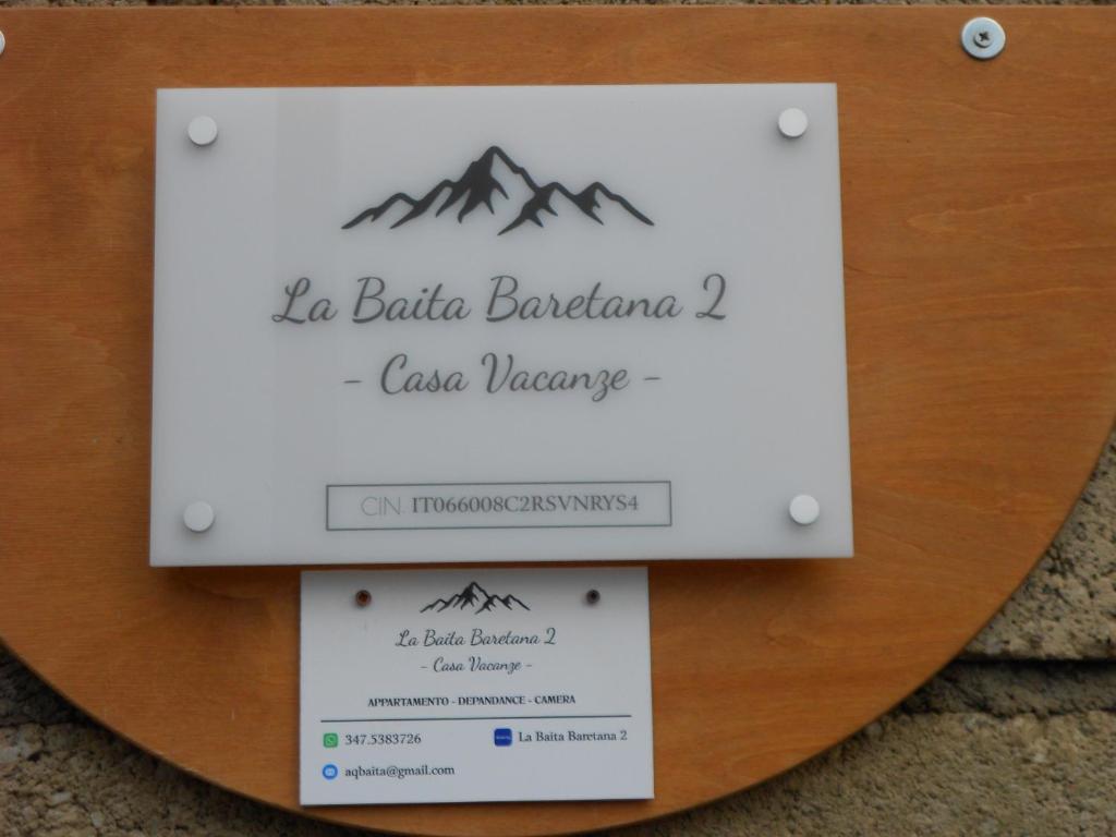 a sign that says no boria barbara cake preserve at La Baita Baretana 2 in Barete