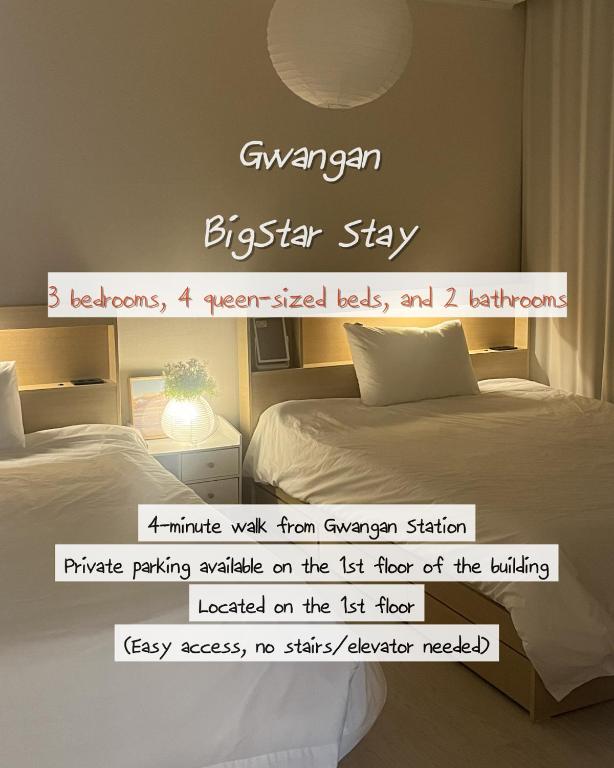 a poster of a bedroom with two beds and a sign at 4 Beds Busan Gwangalli Big Star Stay in Busan