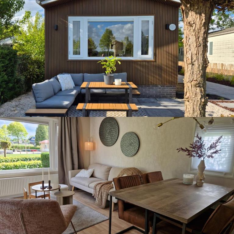 a living room with a couch and a table at Chalet in Berkhout, close to the beach in Berkhout