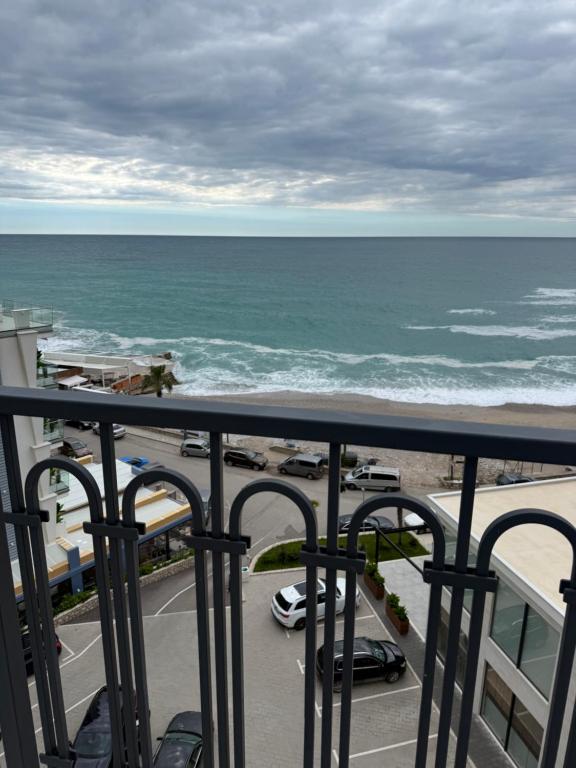 a view of the ocean from the balcony of a condo at Sea Sand Apartment in Bijela Glavica