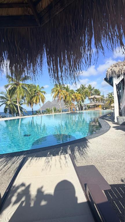 a view of a swimming pool at a resort at STUDIO La Diamantinoise in Le Diamant