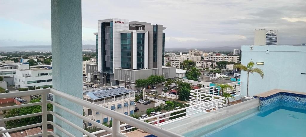 a balcony with a view of a city at New Kingston Condo Apt in Kingston