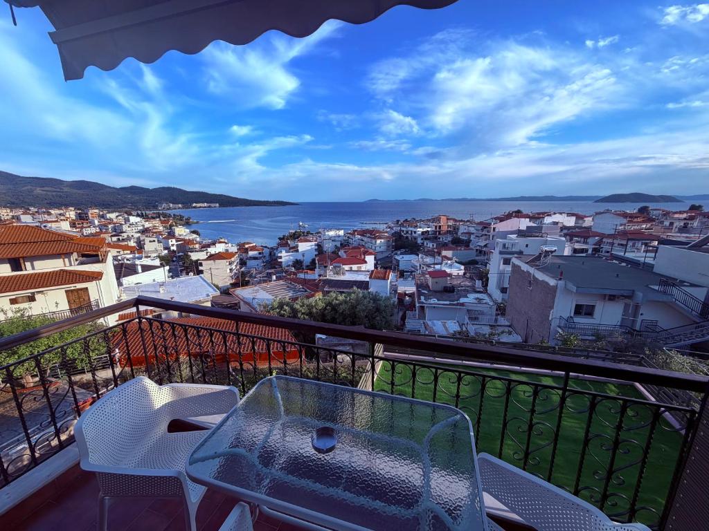 a view of a city from a balcony at House Mistral in Neos Marmaras