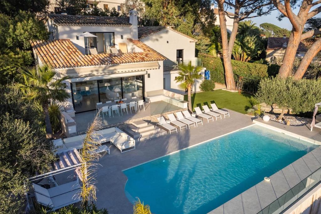 an aerial view of a house with a swimming pool at Corgona Villa in Cannes