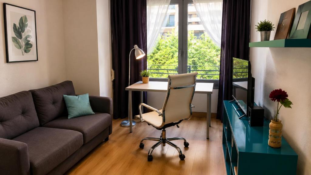 a living room with a couch and a table at Casa Lago in Zaragoza