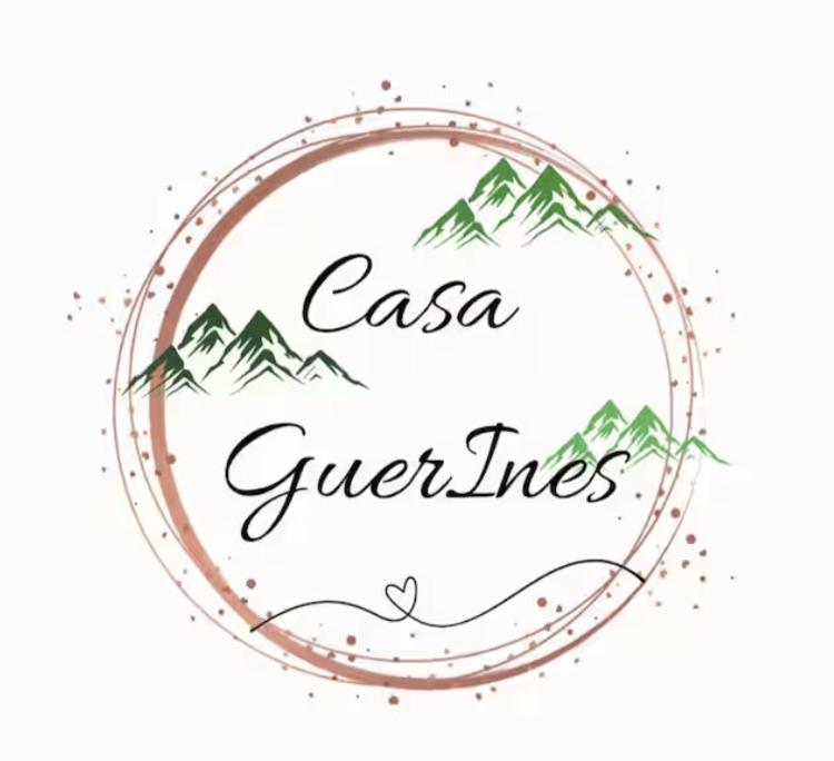 a drawing of an asia green lines in a circle with mountains at Casa Guerines in Tremosine Sul Garda