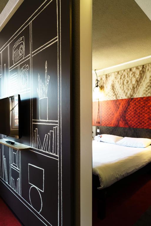 Postel nebo postele na pokoji v ubytování ibis Honfleur
