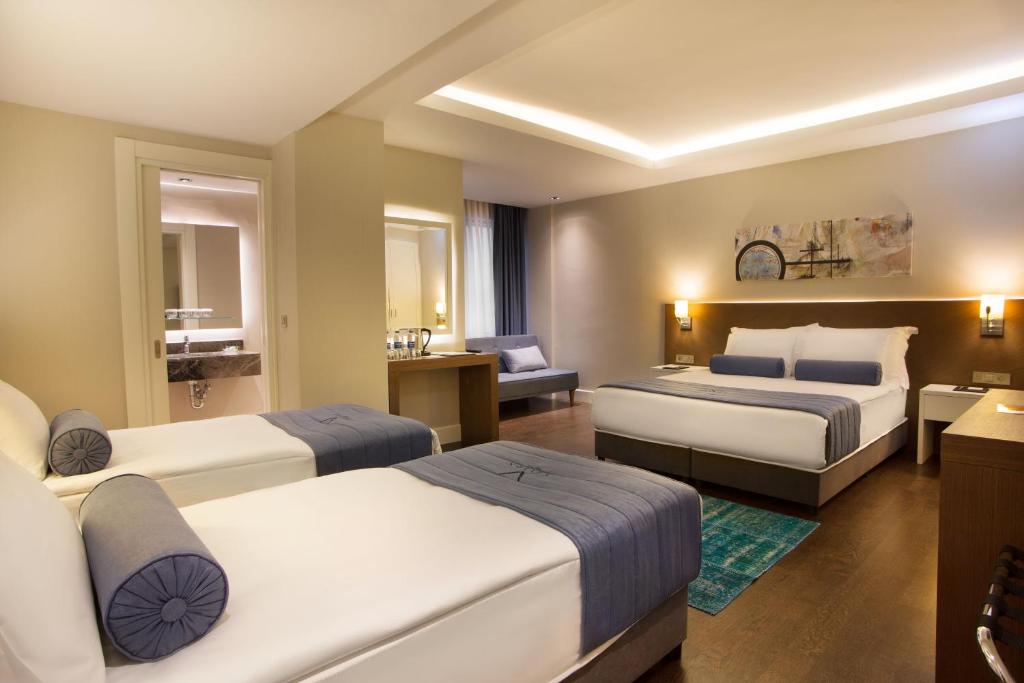 Postel nebo postele na pokoji v ubytování Veyron Hotels & SPA