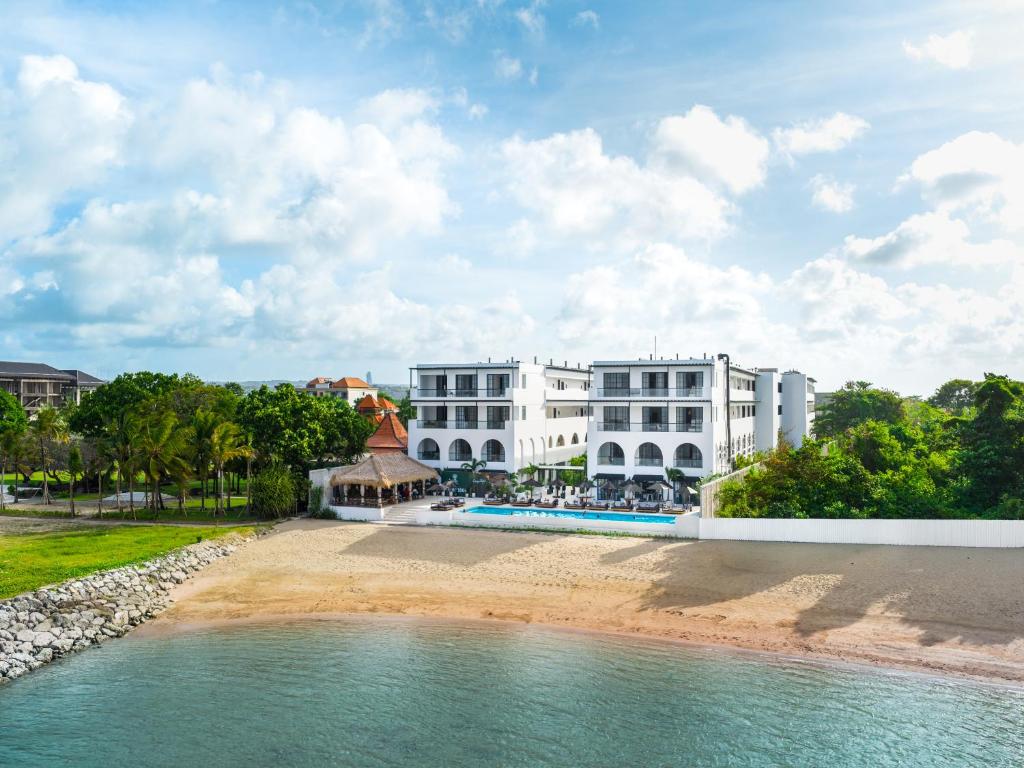 a view of the hotel from the beach at Kiara Beachtown Nusa Dua in Nusa Dua