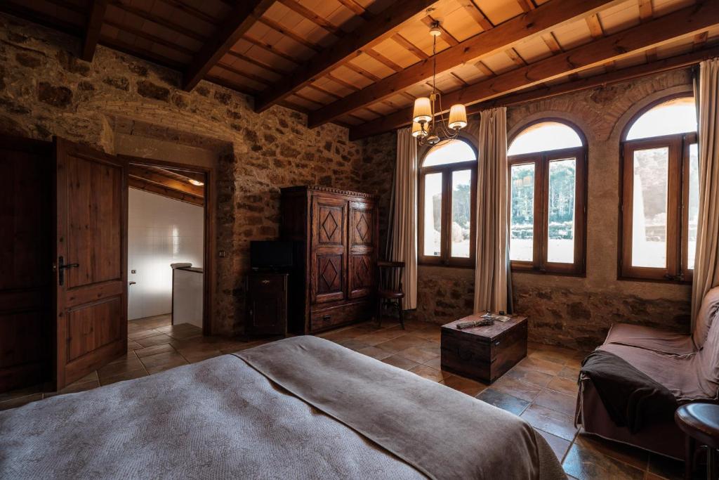 Postel nebo postele na pokoji v ubytování Can Barnosell - Els Masos d'en Coll