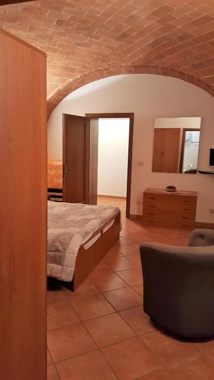 Postel nebo postele na pokoji v ubytování Orto degli Ulivi