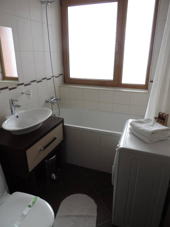 Koupelna v ubytování Monte Carlo Palace Suites