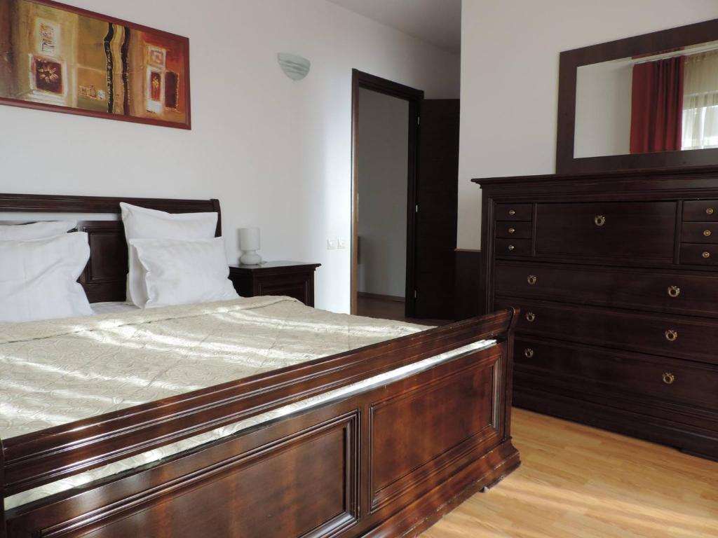Postel nebo postele na pokoji v ubytování Monte Carlo Palace Suites