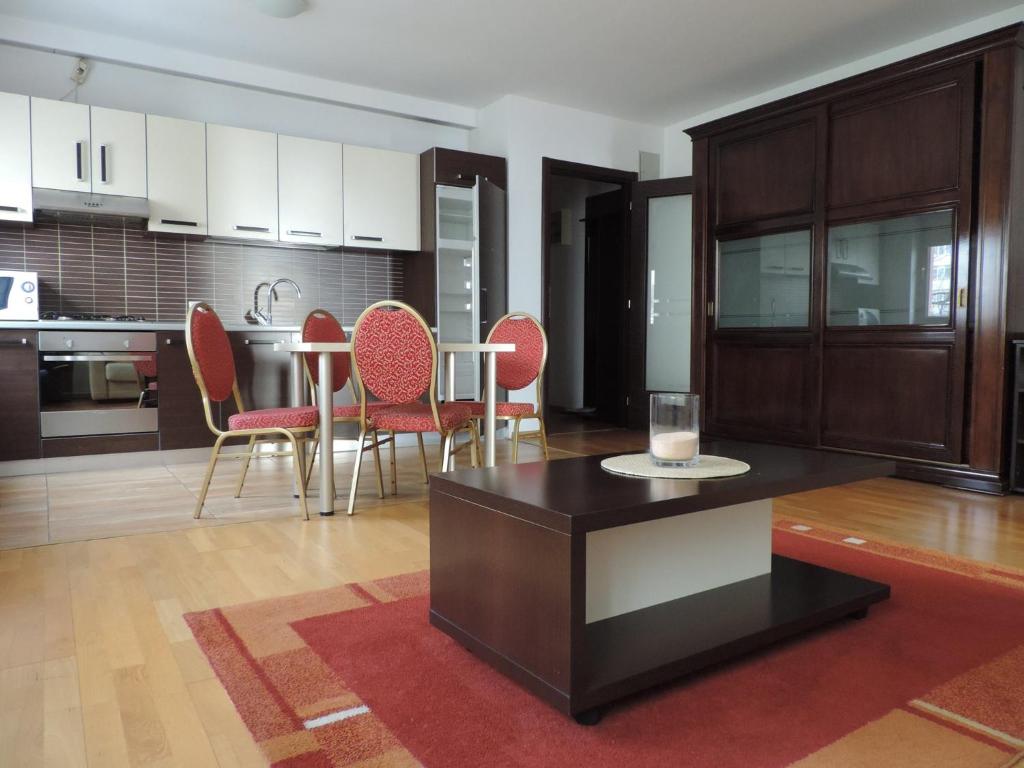Kuchyň nebo kuchyňský kout v ubytování Monte Carlo Palace Suites