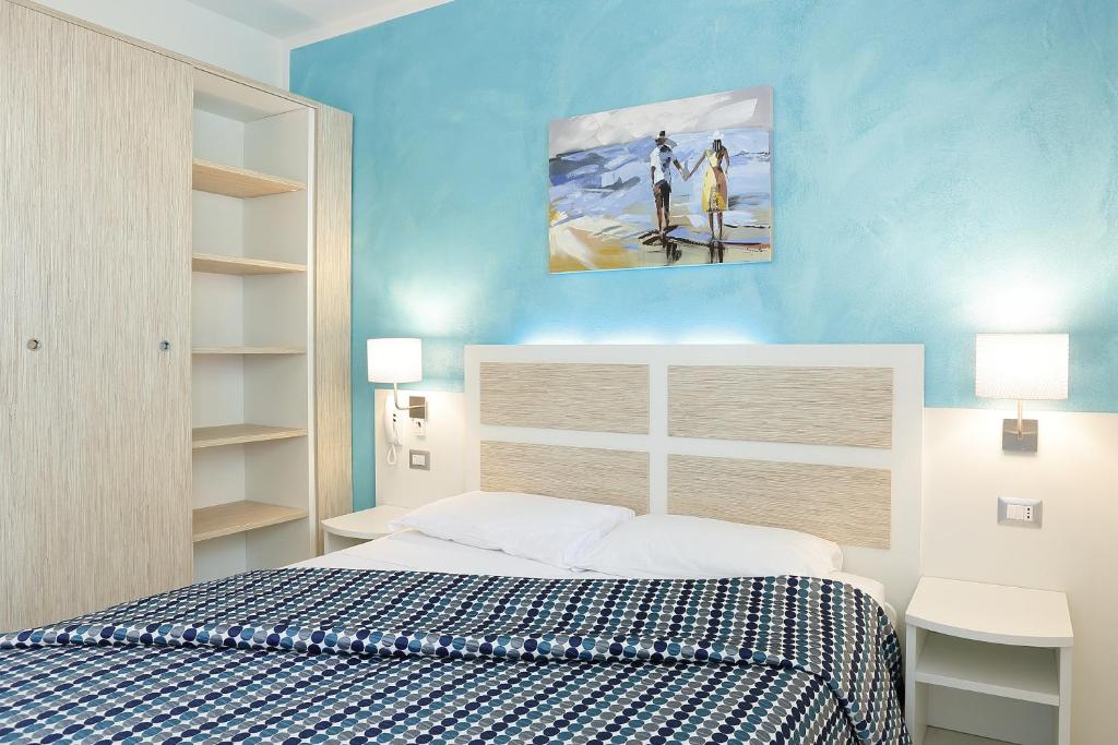 Кровать или кровати в номере Hotel Hiki 3 Superior