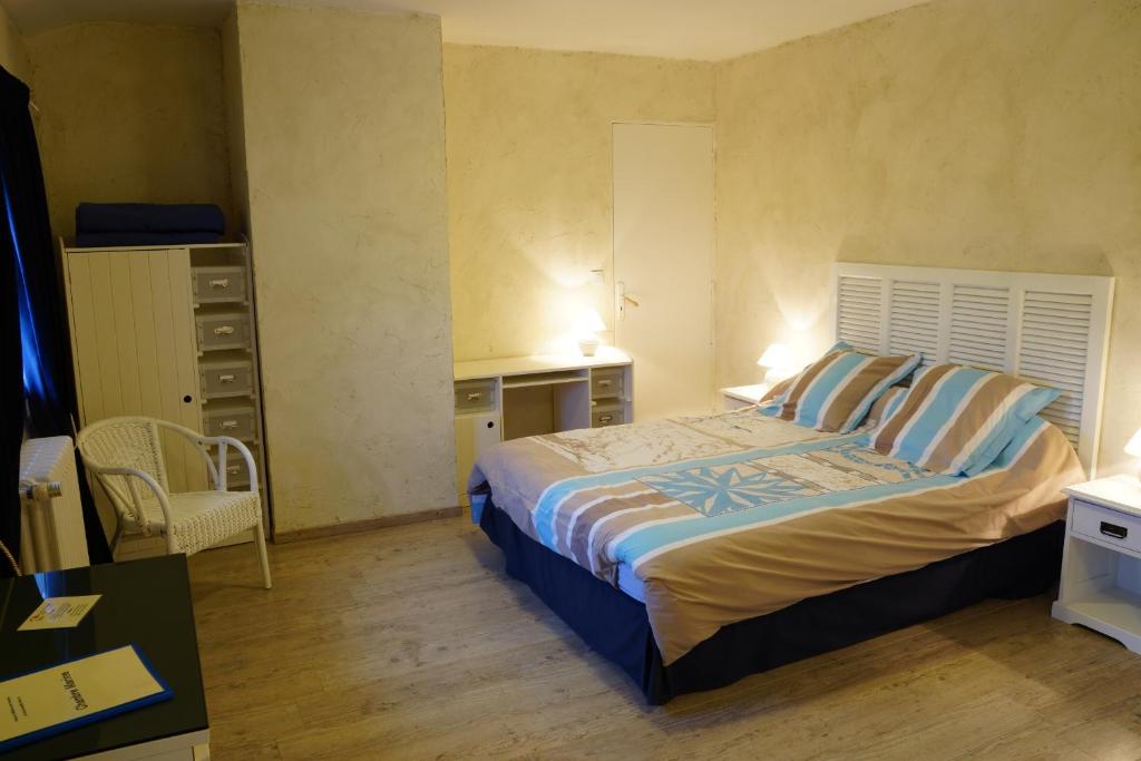 Postel nebo postele na pokoji v ubytování Un Coin de Paradis