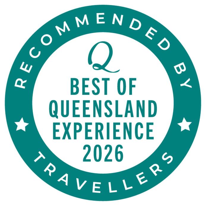 a logo for the academy of queensland experience at Tropical Palms Resort & 4WD Hire in Picnic Bay
