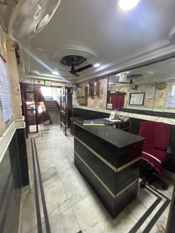 a bar in the middle of a train room at Hotel Shabnam,Near Park St,New Market,Esplanade in Kolkata