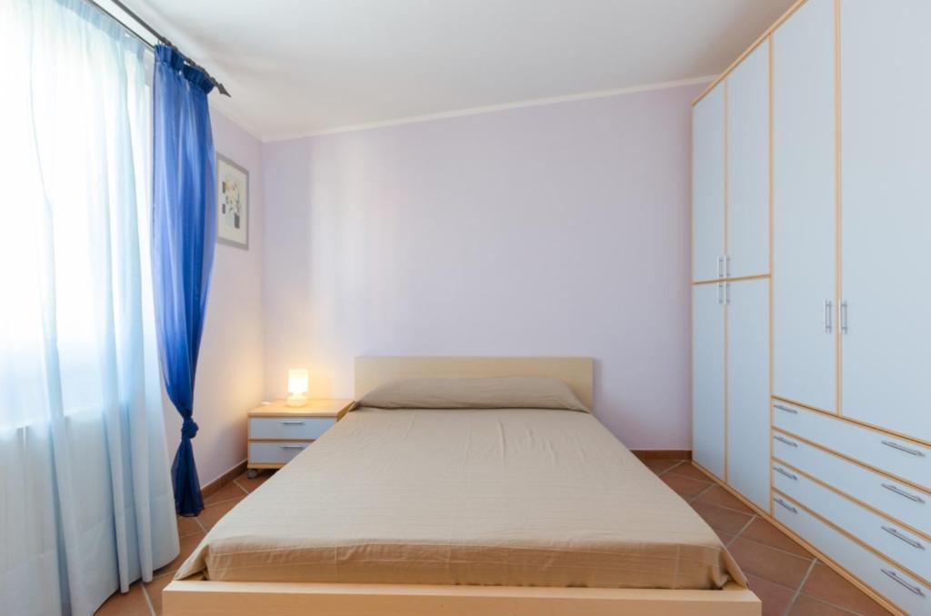 Postel nebo postele na pokoji v ubytování Borgo Dragani