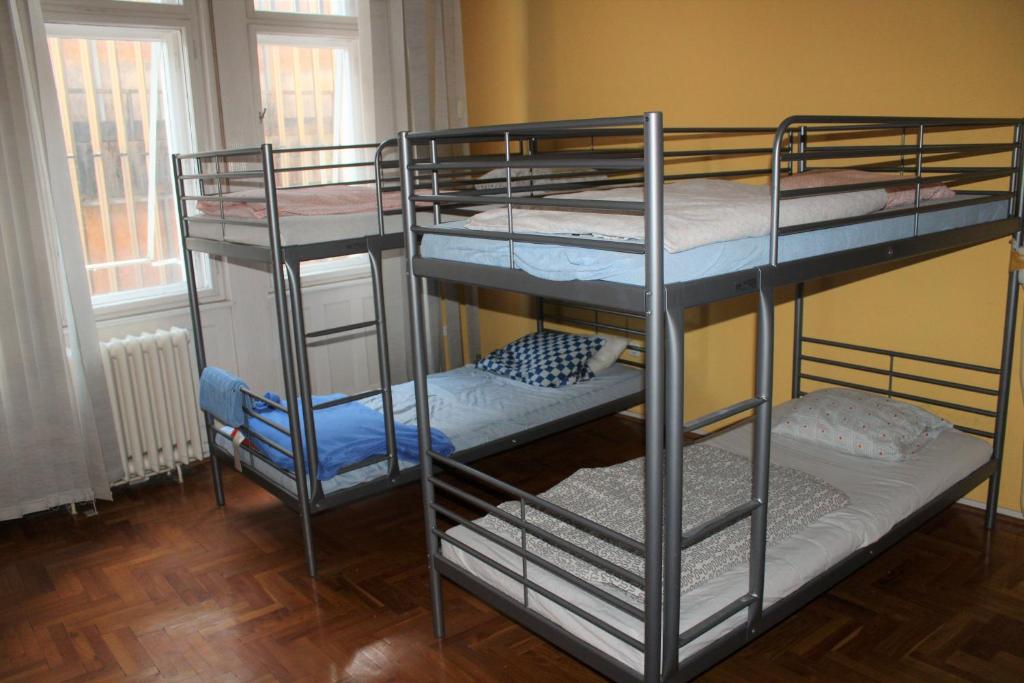 Postel nebo postele na pokoji v ubytování Comebackpackers