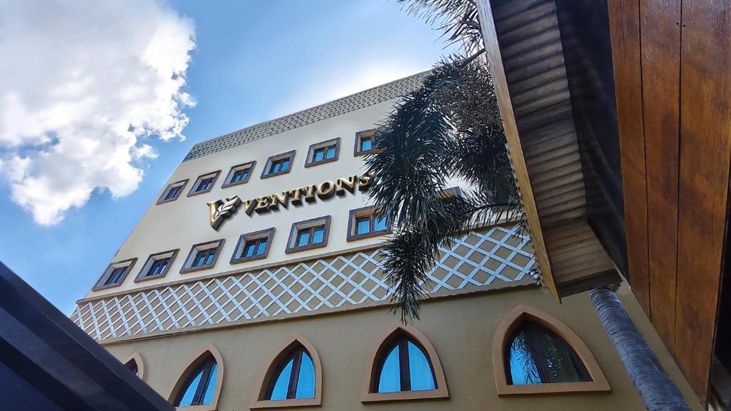 a building with a sign on the side of it at Ventions Sharia Hotel in Jomblang