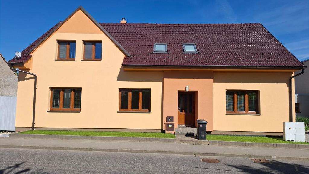 a house on the side of a street at Ubytování U Včelek in Horní Dubňany