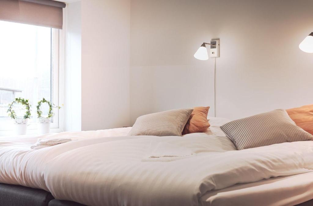 Postel nebo postele na pokoji v ubytování Flygplatshotellet