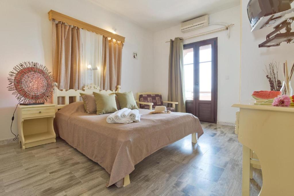 Postel nebo postele na pokoji v ubytování Hotel Castillio