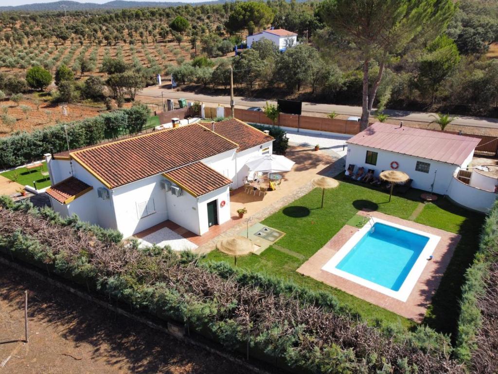 an aerial view of a house with a swimming pool at Alojamientos Rurales La Codosera in La Codosera