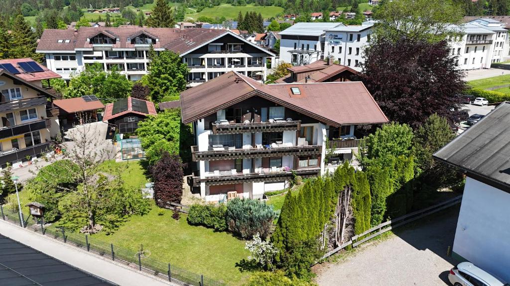 an aerial view of a house in a city at T13 Ferienwohnungen Schenk in Oberstdorf
