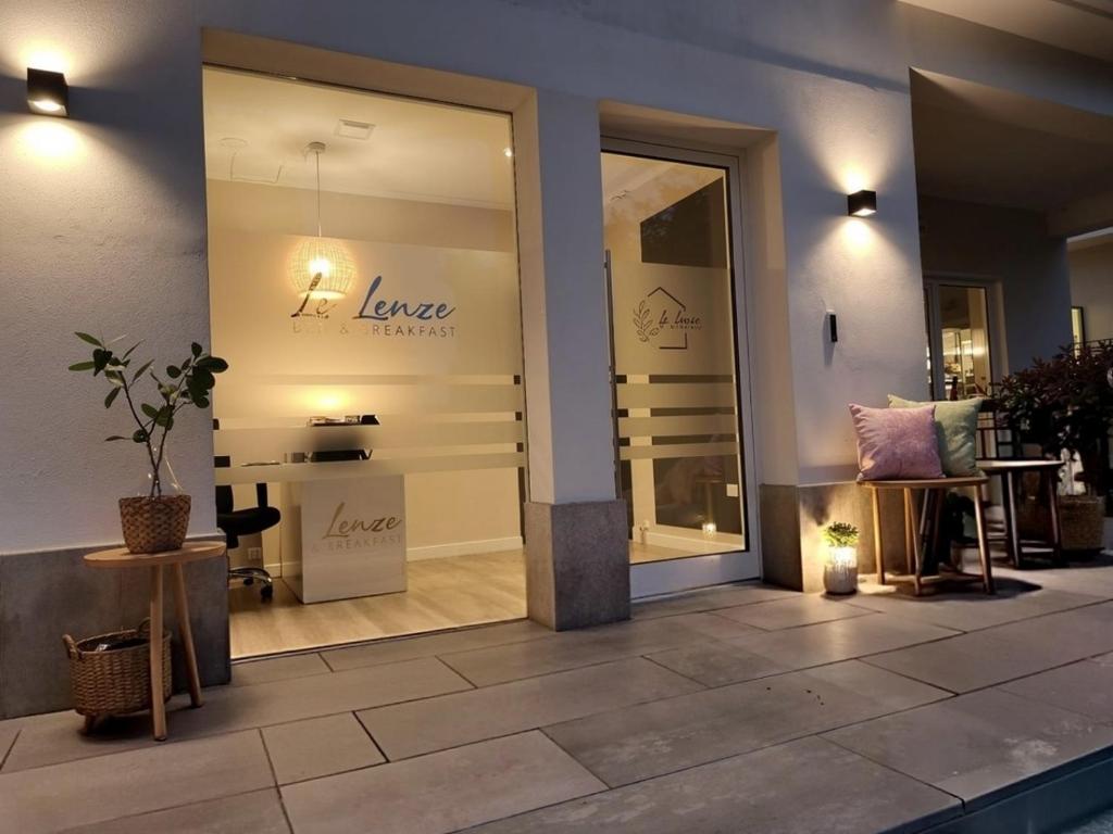 a store front with a sliding glass door in a store at Le Lenze in Pozzilli