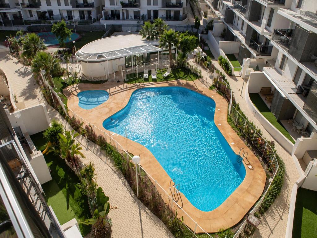 Apartamento Tulipán en Dénia Urb Marina Real III Terraza, varias piscinas y gimnasio cerca de la playa Las Rotas