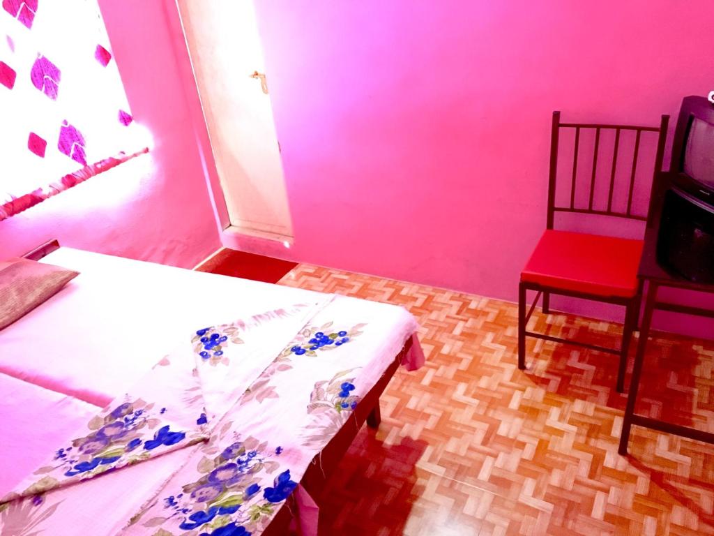 Postel nebo postele na pokoji v ubytování Pleasant Inn