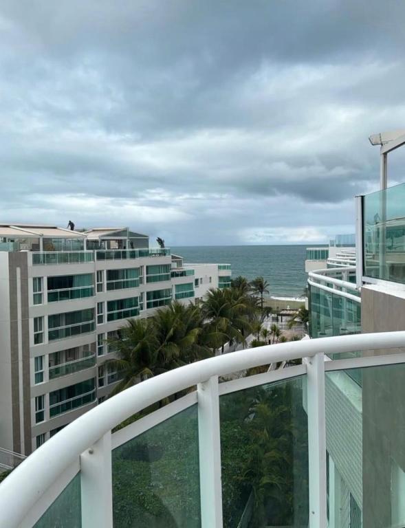 a view of the ocean from the balcony of a building at Cobertura 435 - In mare bali in Parnamirim