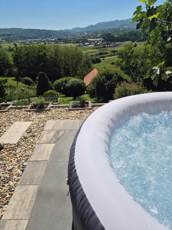 a swimming pool in a yard with a fence around it at Kuća Za Odmor Barbara in Donja Stubica