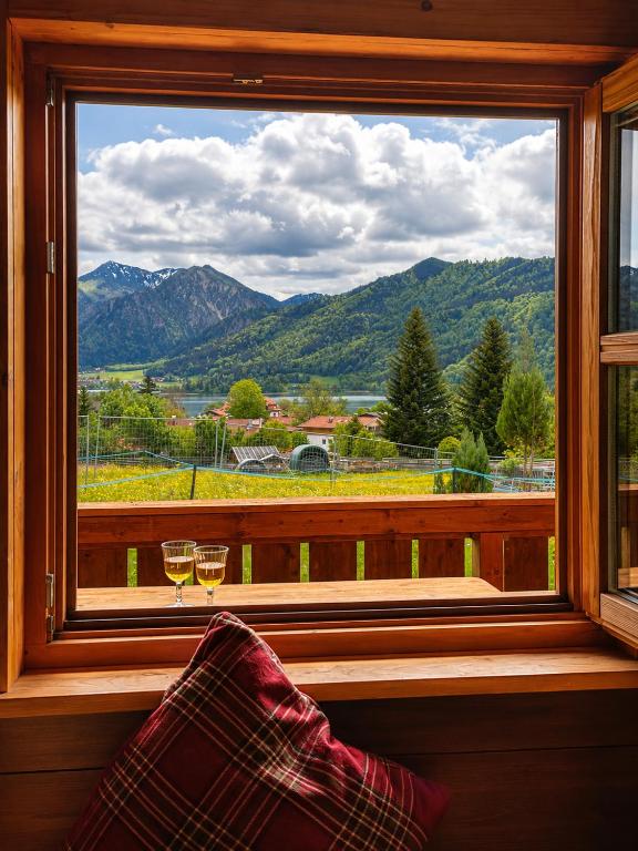a window with a view of a mountain view at Chalets mit Schlierseeblick, neue Küche neues Bad in Schliersee