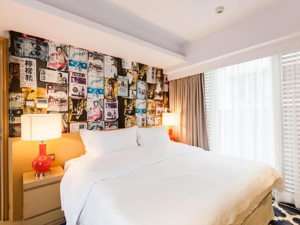 Voodi või voodid majutusasutuse Caravel Hotel toas