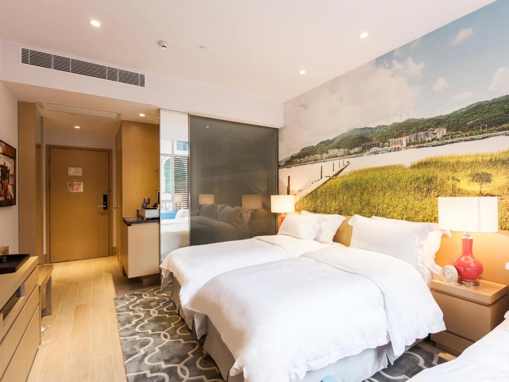 Voodi või voodid majutusasutuse Caravel Hotel toas