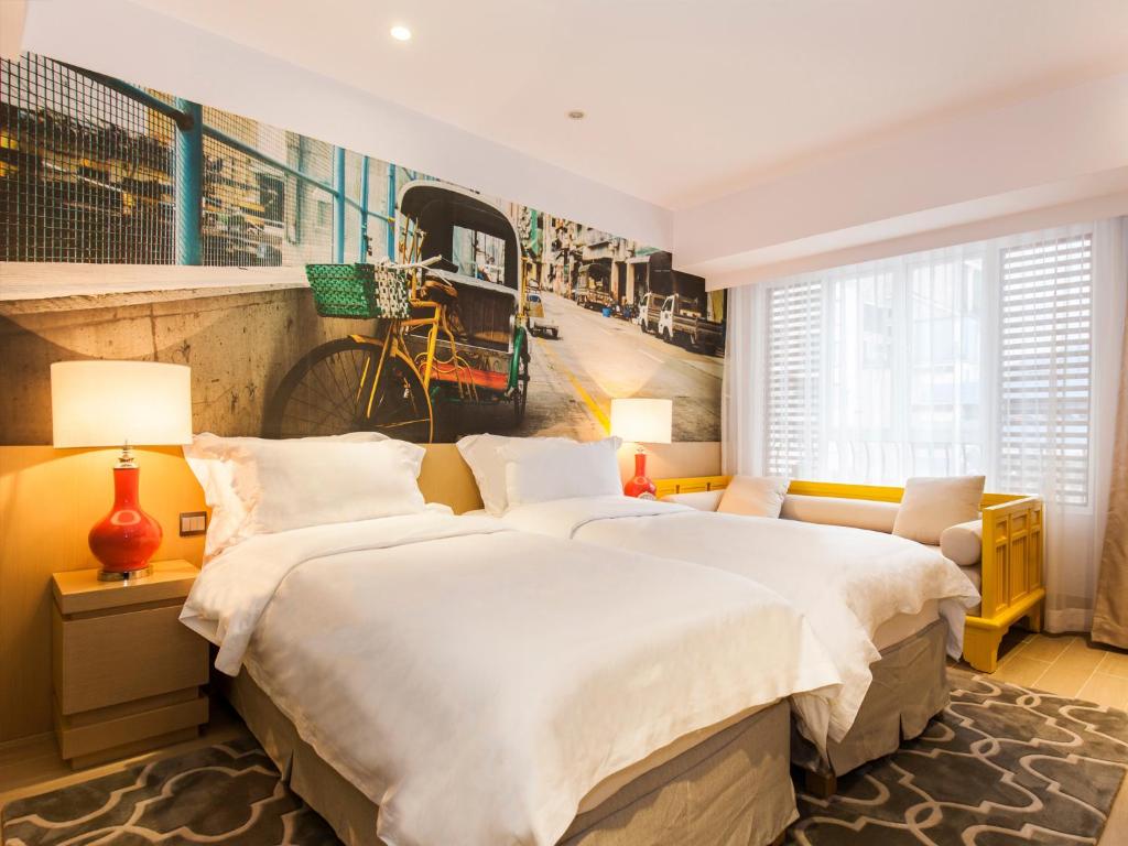Voodi või voodid majutusasutuse Caravel Hotel toas